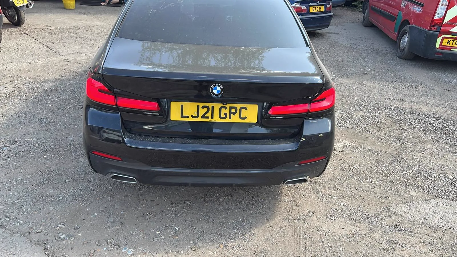 Repaired black BMW saloon finished and ready for collection